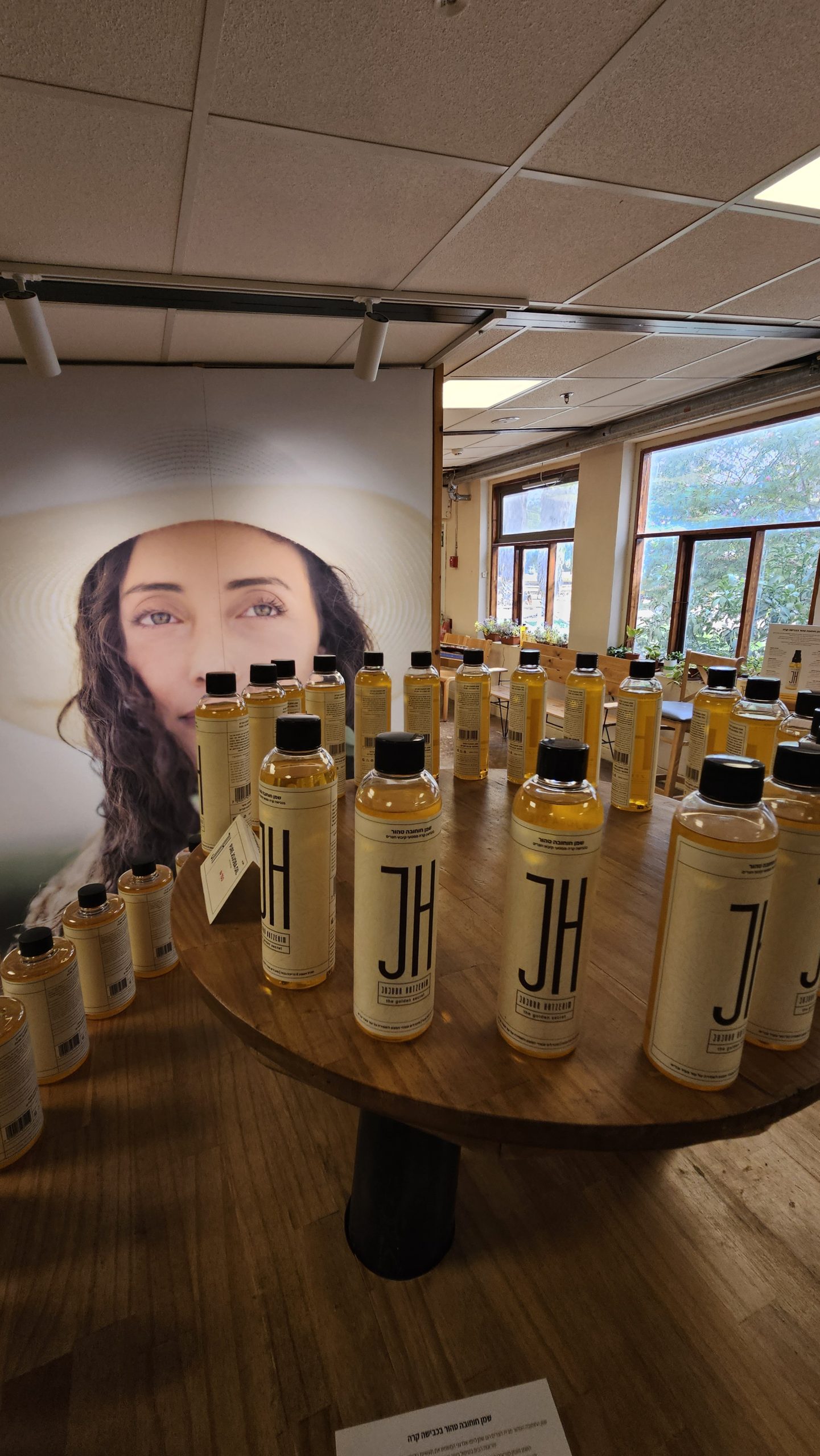 Glass bottles of golden jojoba oil for a simple plant-forward skincare routine