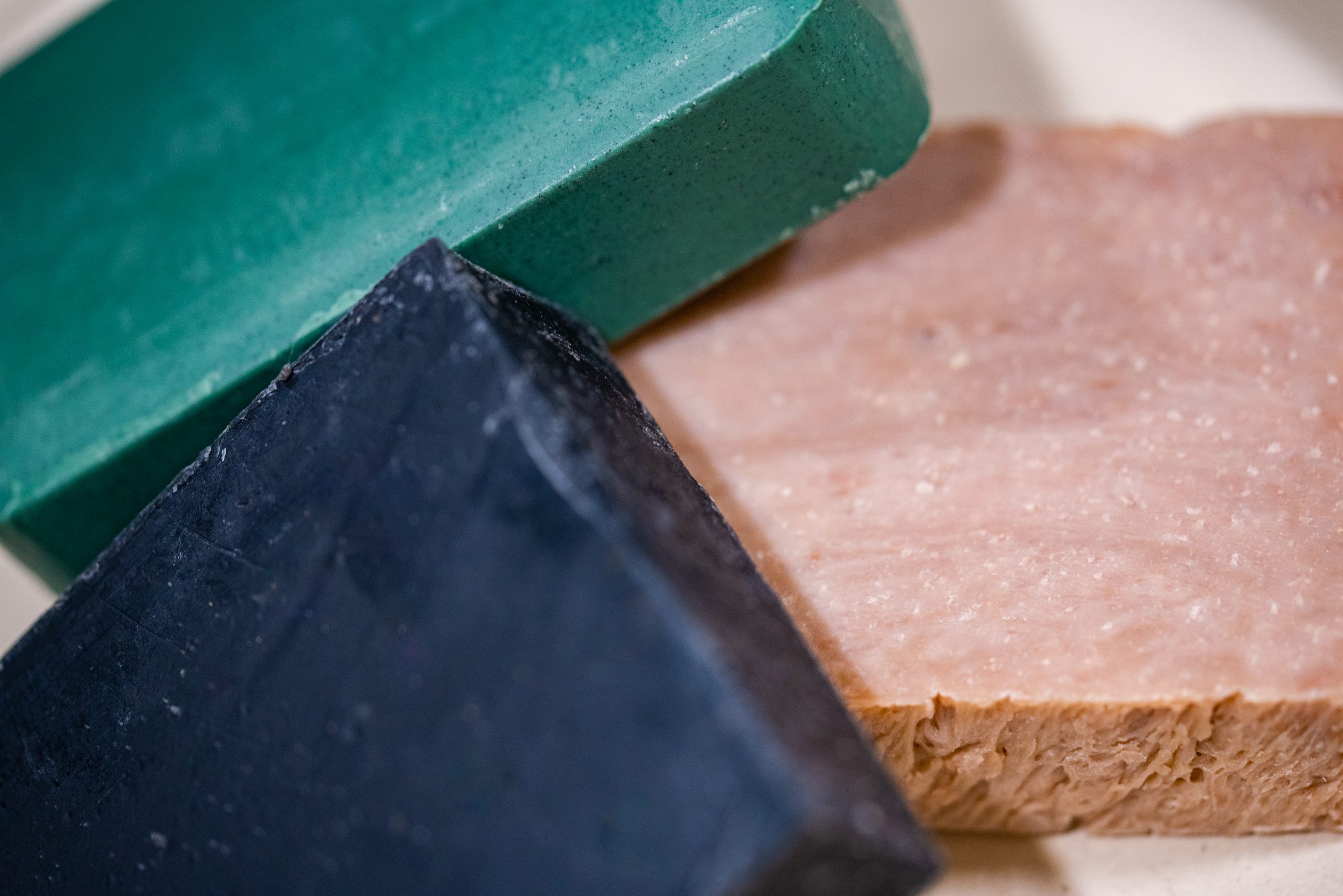 Natural handmade soap bars arranged for a simple summer shower routine