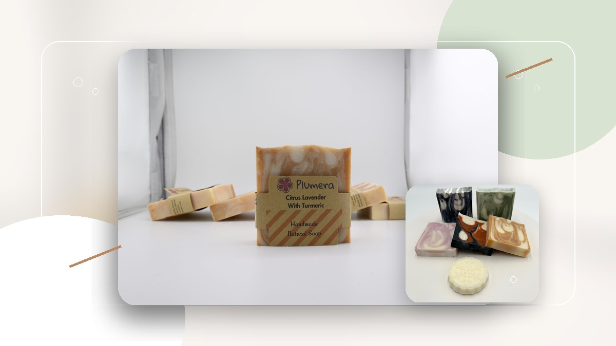 Handmade Plumera soap bars arranged with botanicals for a clean beauty blog article