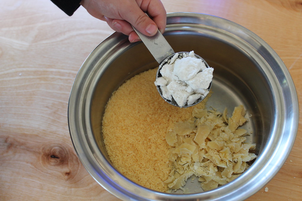 Shea butter and natural clean beauty ingredients in a mixing bowl