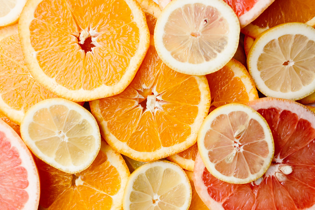 Fresh citrus slices arranged in bright summer colors