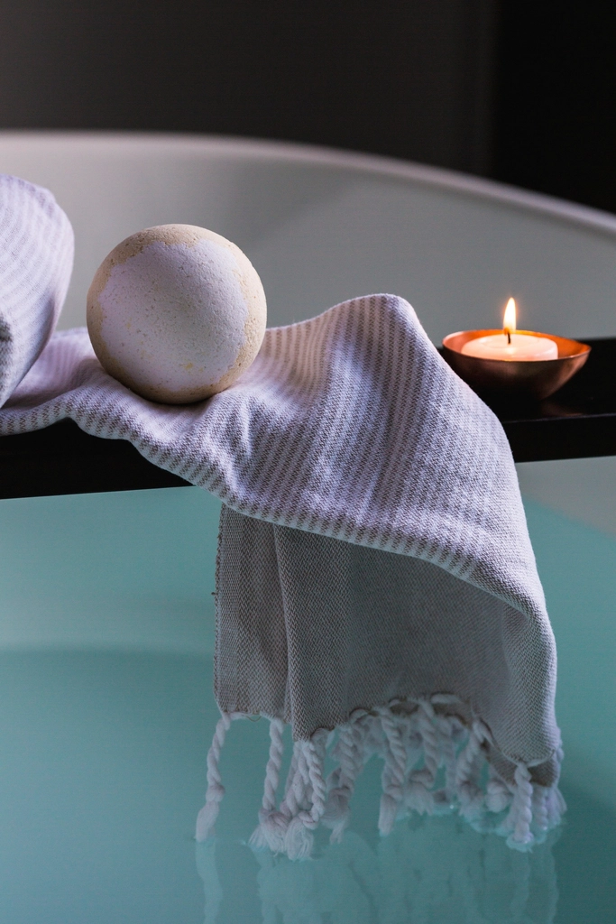 Spa towel and bath scene for simple handmade soap care