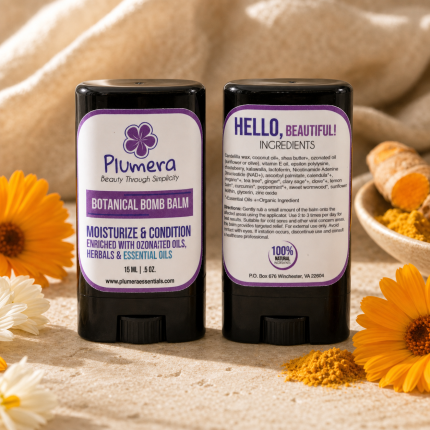 Two Plumera Botanical Bomb Balm 0.5 ounce sticks showing the compliant front concept and current unchanged back label