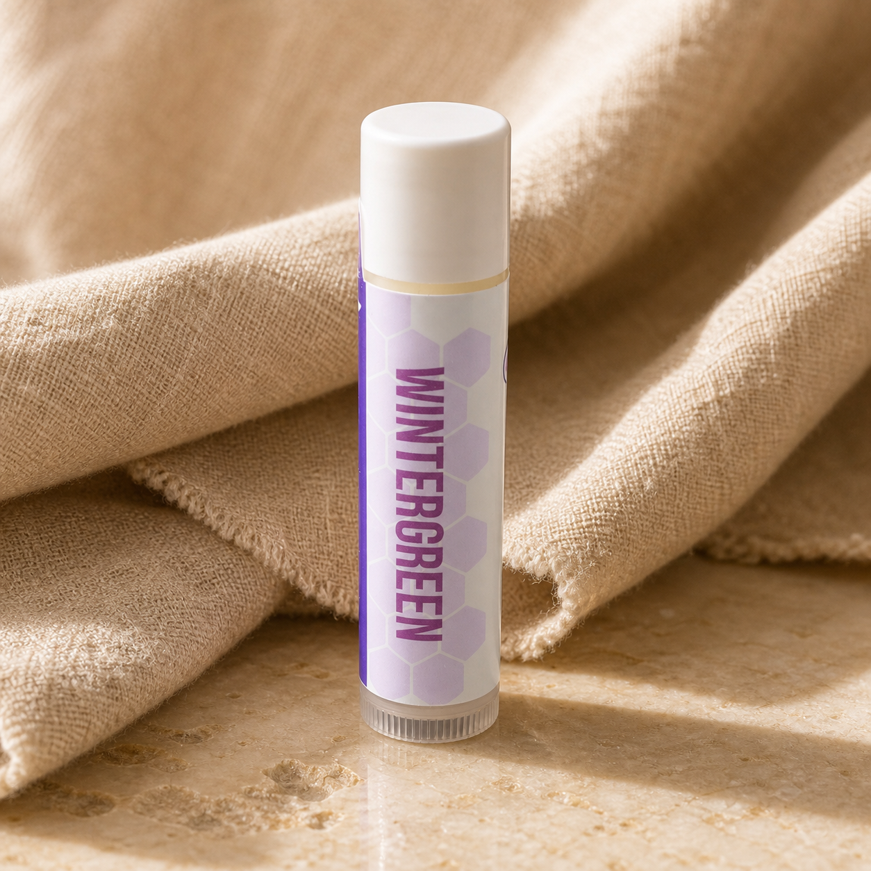 Single Wintergreen handmade lip balm tube by Plumera Essentials